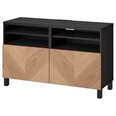 a black and oak entertainment center with two doors