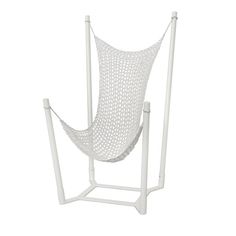 a white hammock chair sitting on top of a stand