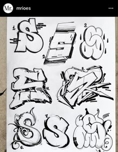 some type of graffiti on a piece of paper