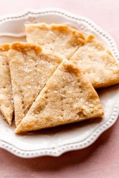 some crackers are on a white plate