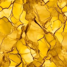 an abstract yellow and brown background with lots of small cracks in it's surface