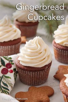 gingerbread cupcakes with white frosting on a plate