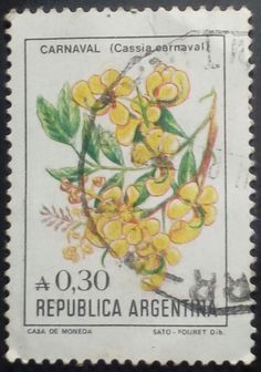 a postage stamp with yellow flowers and green leaves on the front, in black frame