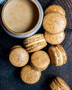 some cookies and a cup of coffee on a table