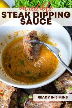 a white bowl filled with soup next to some meat