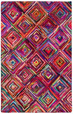 a multicolored area rug with squares and rectangles on the bottom in various colors