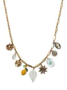 An easy to wear charm necklace that feels light and airy and oh so vintage. These seemingly unrelated charms , an enameled vintage lemon, complete with leaf ,a blue vintage florals inset in a clear cabachon, an antiqued gold colored shirt & detailed flower charms, and more hang off an interesting antique gold flat link chain. Adjustable 15" -19", Extender Chain. Handmade , Vintage. Bohemian Gold Enamel Necklace, Gold Bohemian Enamel Necklace, Gold Enamel Bohemian Necklace, Vintage Enamel Jewelry With Vintage Charm, Vintage Gold Jewelry With Flower Charm, Vintage Enamel Necklaces With Lobster Clasp, Vintage Brass Jewelry With Flower Charm, Vintage Antique Gold Necklaces With Charms, Antique Gold Vintage Charm Necklaces