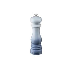 a blue and white chess piece on a white background