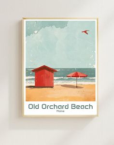 an old orchard beach poster hangs on the wall next to a chair and red umbrella