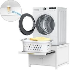 a washing machine with the door open next to a laundry basket