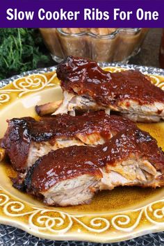 slow cooker ribs for one on a yellow plate with text overlay that reads slow cooker ribs for one