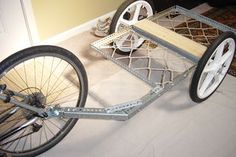 a bicycle is being assembled and ready to be used as a cart for transporting items