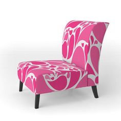 a pink and white patterned chair with black legs