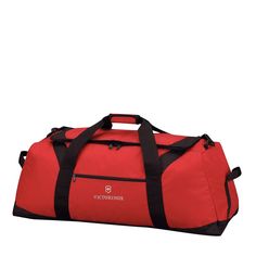 a red duffel bag with black straps and the word victory on it's side