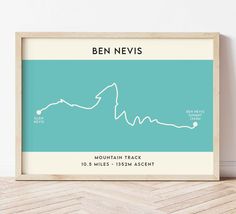 the ben nevis mountain track map print is displayed in a wooden frame on a wood floor