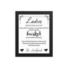 a framed sign with the words ladies in black and white, on a white background