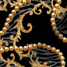 a black and gold wallpaper with some pearls on it's side, as well as zebra print