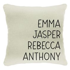 an embroidered pillow with the names of people in black on white linen, which reads,'emma jasperr, rebeca anthony