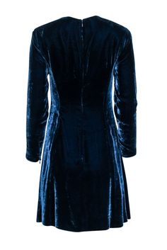 Get ready to make a statement in this Ralph Lauren teal velvet dress! Perfect for any cocktail party, this dress features long sleeves and a rich teal blue color. Dress it up with some statement jewelry and a classic pump. Show off your unique style and stand out from the crowd! Size 6 75% Rayon, 25% Silk Unlined Invisible back zipper Shoulder pad detail Long sleeves Bust 32" Waist 30" Shoulder to hem 35.5" Sleeve length 23" Fitted A-line Velvet Dress For Formal Occasions, Blue Long Sleeve Dress For Fall Party, Blue Long Sleeve Party Dress For Fall, Elegant Fitted Blue Long Sleeve Dress, Elegant Blue Velvet Evening Dress, Blue Fitted Long Sleeve Dress For Formal Occasions, Blue Fitted Long Sleeve Formal Dress, Formal Fitted Blue Long Sleeve Dress, Fitted Blue Velvet Dress