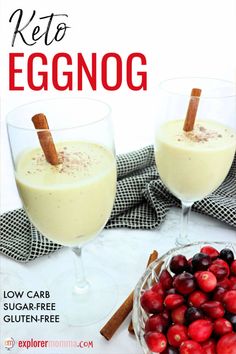 the cover of keto eggnog with two glasses filled with fruit and cinnamon sticks