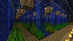 the inside of a minecraft building with trees and plants in it, all lit up by lights