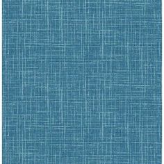 a blue fabric textured background for wallpaper or curtains with vertical lines and horizontal stripes