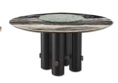 the table is made out of marble and has two black pillars on each side with round glass top