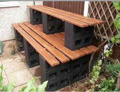 the bench is made out of cinder blocks