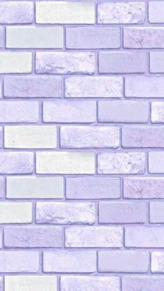 a white brick wall that is very light purple and has no mortars or mortars on it