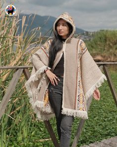 HANDMADE WOOL CAPE These capes are handcrafted by Ecuadorian artisans in the Andes with unique techniques and designs. The luxurious wool capes are not only beautiful and unique, but they will keep you very warm during winter and fall with style. These capes are open in the front and can be used by women and men. ITEM DESCRIPTION They are made from 100% wool.  Measurements are as follows: 43 inches in width and 33 inches in length (including the fringes). They are One size fit most. WASHING INST Artisan Poncho For Fall, Artisan Poncho For Fall One Size, Handwoven Wool Poncho For Fall, Bohemian Wool Cape For Fall, Handmade Artisan Poncho For Fall, Traditional Beige Poncho For Winter, Bohemian Wool Shawl Outerwear, Bohemian Wool Poncho In Cape Style, Traditional Handmade Winter Cape