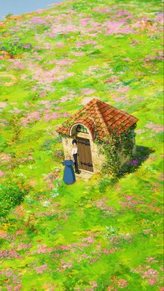 a small house in the middle of a green field with flowers and grass around it