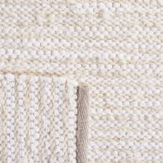 close up view of the textured white rugs