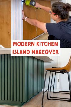 a woman is using a drill to paint the kitchen island makeover with green cabinets