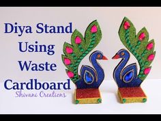 two peacocks are standing next to each other with the words diy stand using waste cardboard