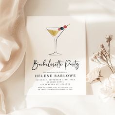 a white card with a cocktail glass on it and the words bachelor party written in black ink