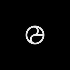 the letter e in a white circle on a black background, with an oval at the center