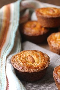 several muffins sitting on top of a cloth