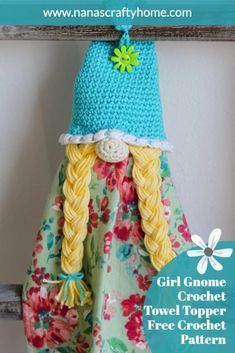 a crocheted doll is hanging on a clothes line with the words girl gnome crochet towel topper free crochet pattern