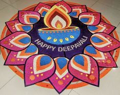 a colorful happy deepavai design on the floor