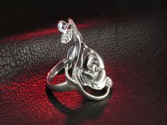 "Charming silver rose ring. Hallmark: 925 Approximate weight: 6.2 g Width: 1.14 inches Shipping: - we prepare our orders ready for shipping in 3-7 business days, all items are made to order, they are not kept in stock; - we will provide tracking number as soon as order will be shipped. EXPRESS shipping: if you are interested in FAST delivery, we offer very fast and high quality \"door to door\" service by UPS Express. Delivery: within Europe - 1 business day, within USA, Canada and Australia - 1 Silver Rose Design Ring, Silver Ring With Rose Design, Elegant Silver Rings With Rose Details, Silver Rings With Rose Design For Formal Occasions, Silver Rose Ring Jewelry, Silver Rose Ring, Gothic Rose, Rose Ring, Rose Jewelry