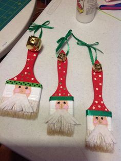 three christmas decorations made to look like toothbrushes