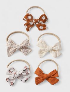 Enhance your baby girl's style with our 5-Piece Baby Girl Cotton Bows Headband Set. This delightful set features headbands adorned with soft cotton bows in a variety of colors, perfect for complementing any outfit. The comfortable elastic bands ensure a secure yet gentle fit, making these headbands ideal for everyday wear or special occasions. Your little one will look extra cute with these charming accessories. Cute Cotton Headband For Playtime, Cute Cotton Hair Accessories For Gifts, Cute White Cotton Hair Accessories, Adjustable Cotton Headband For Playtime, Cute Cotton Headband Hair Accessories, Cute Adjustable Cotton Hair Accessories, Hairband For Baby Girl, Adjustable Cotton Bow - Cute Style, Adjustable Cute Cotton Bow