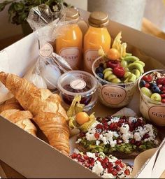 an open box filled with different types of food and condiments on top of it