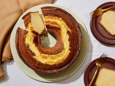 a bundt cake on a plate with two slices cut out and ready to be eaten