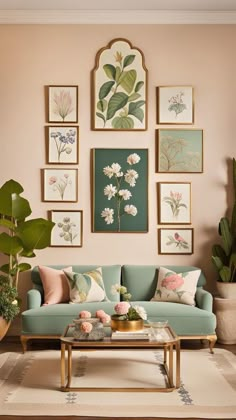 a living room filled with furniture and pictures on the wall above it's coffee table