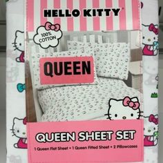 the hello kitty bedding set is pink and white