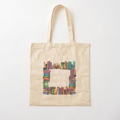 there is a tote bag with books on it