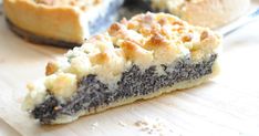 a piece of pie sitting on top of a wooden cutting board