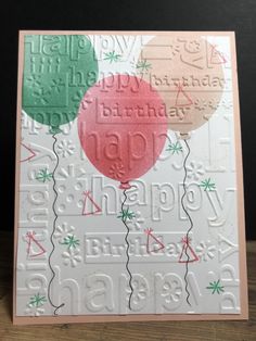 a birthday card with balloons on it