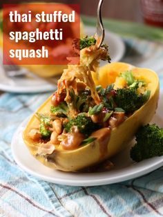 the stuffed squash is filled with broccoli and nuts